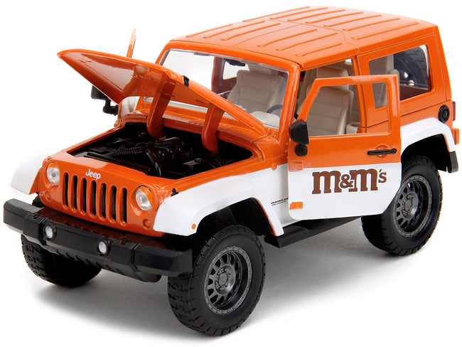 2017 Jeep Wrangler Orange Metallic and White and Orange M&M Diecast Figure "M&M's" "Hollywood Rides" Series 1/24 Diecast Model Car by Jada-Jada-ModelCars.com