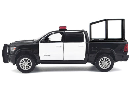 2019 RAM 1500 Laramie Crew Cab Pickup Truck with Bed Cage Black and White with Flashing Light Bar and Front and Rear Lights and Sounds 1/27 Diecast Model Car by Motormax-Motormax-ModelCars.com