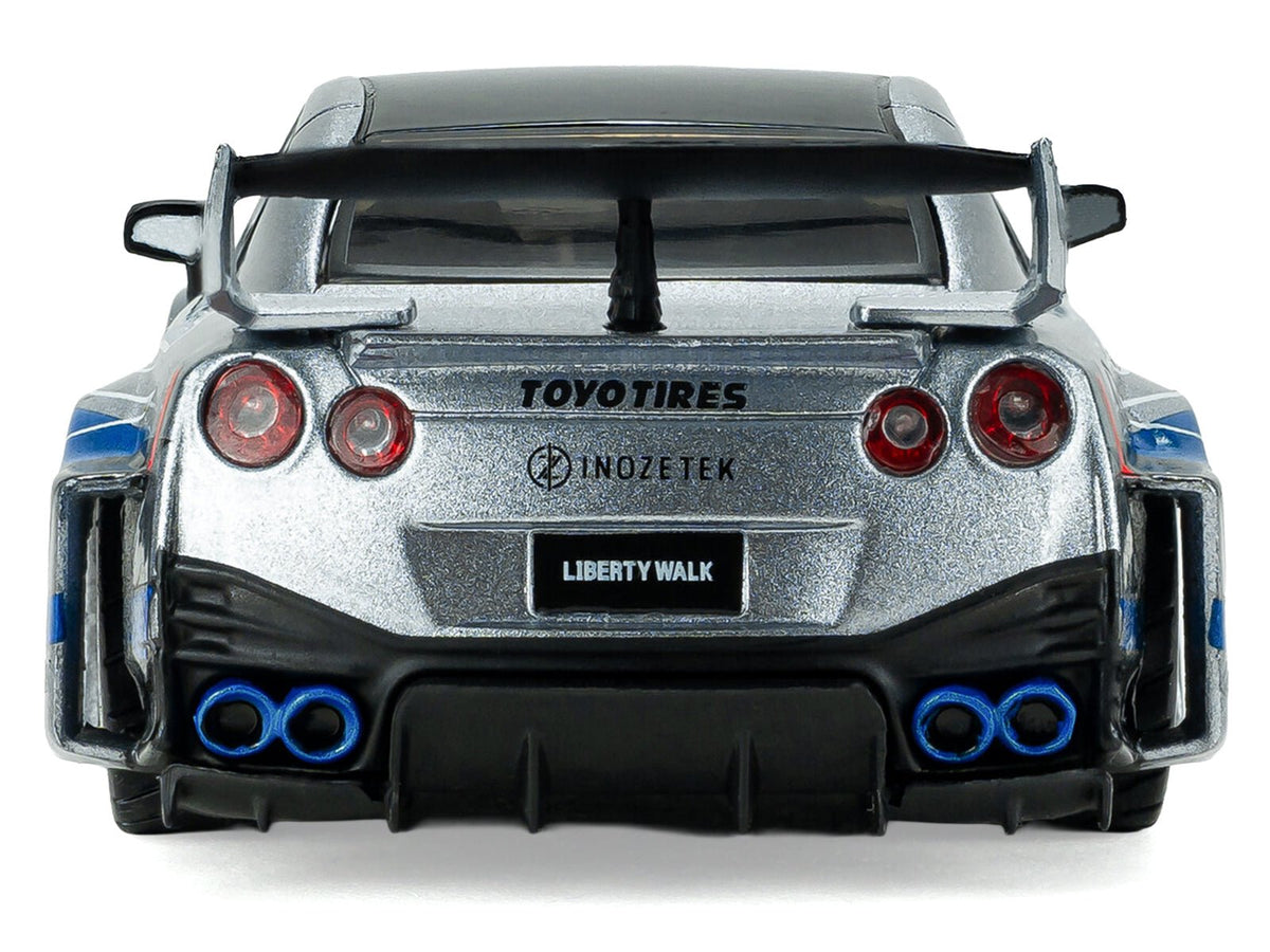 2020 Nissan GT-R (R35) Liberty Walk Silhouette RHD (Right Hand Drive) Silver Metallic with Black Top and Blue Graphics 1/43 Diecast Model Car by Solido-Solido-ModelCars.com