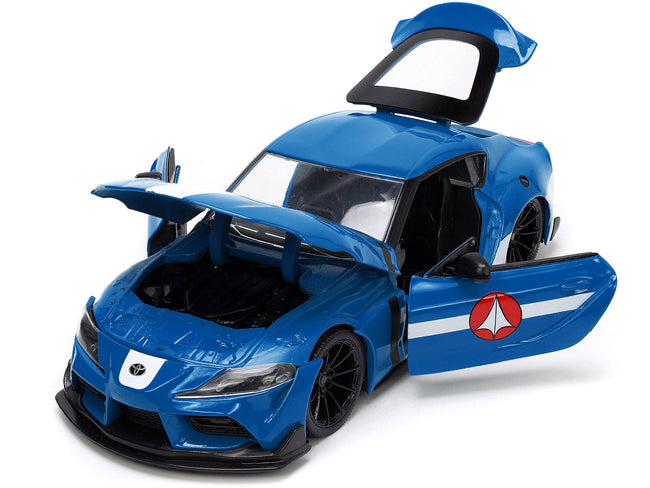 2020 Toyota Supra Blue with Graphics and Max Sterling Diecast Figurine "Robotech" "Hollywood Rides" Series 1/24 Diecast Model Car by Jada-Jada-ModelCars.com