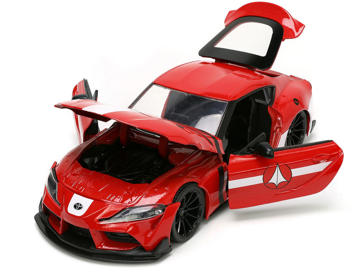 2020 Toyota Supra Red with Graphics and Miriya Sterling Diecast Figurine "Robotech" "Hollywood Rides" Series 1/24 Diecast Model Car by Jada-Jada-ModelCars.com