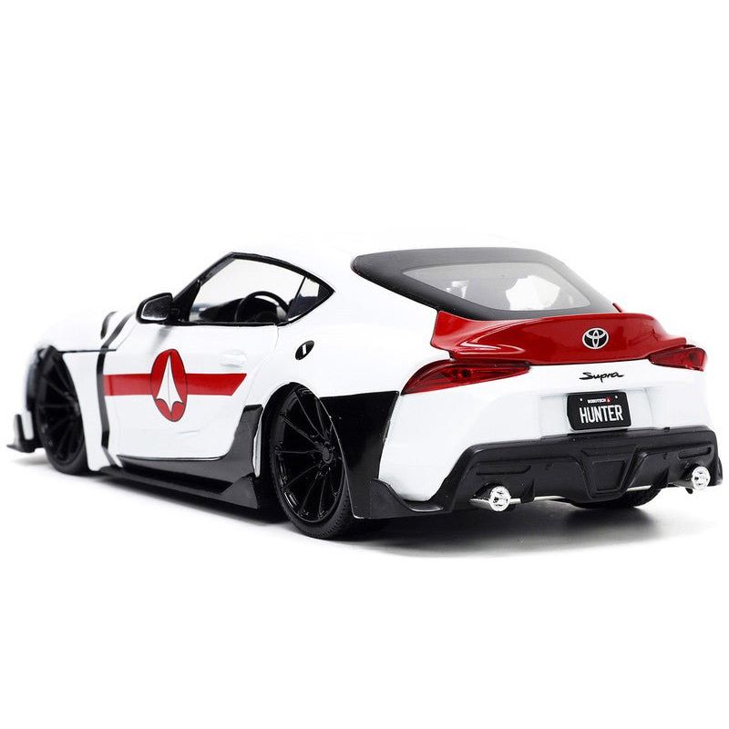 2020 Toyota Supra White and Rick Hunter Diecast Figurine "Robotech" "Hollywood Rides" Series 1/24 Diecast Model Car by Jada-Jada-ModelCars.com
