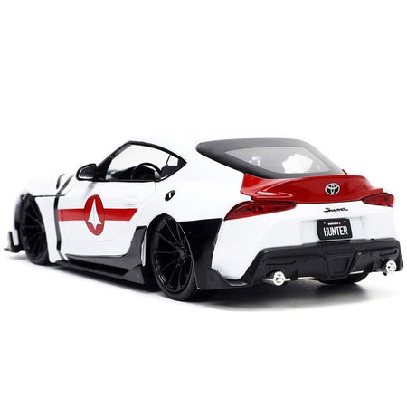 2020 Toyota Supra White and Rick Hunter Diecast Figurine "Robotech" "Hollywood Rides" Series 1/24 Diecast Model Car by Jada-Jada-ModelCars.com