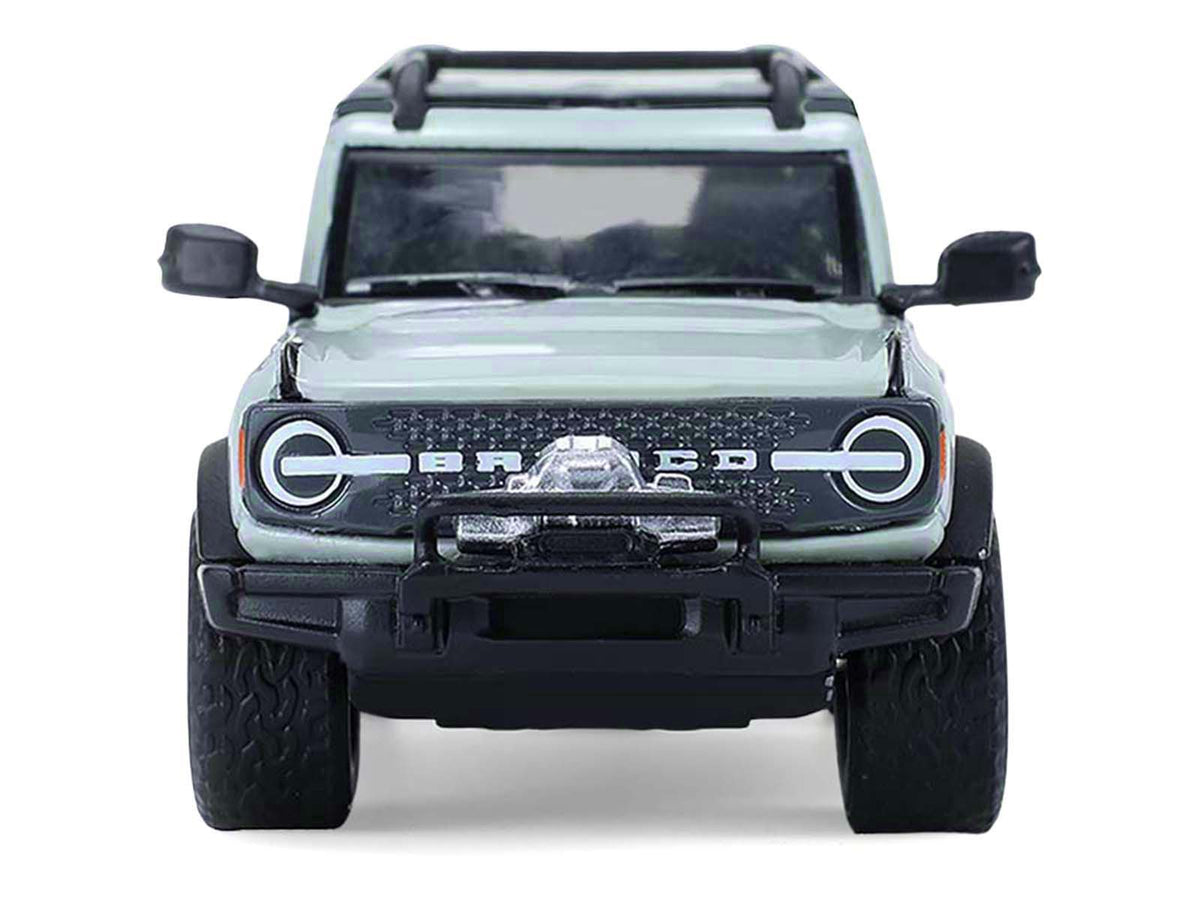 2021 Ford Bronco 4-Door Badlands Cactus Gray with Black Top and Motorcycle with Utility Trailer "Hitch & Tow" Series 33 1/64 Diecast Model Cars by Greenlight-Greenlight-ModelCars.com