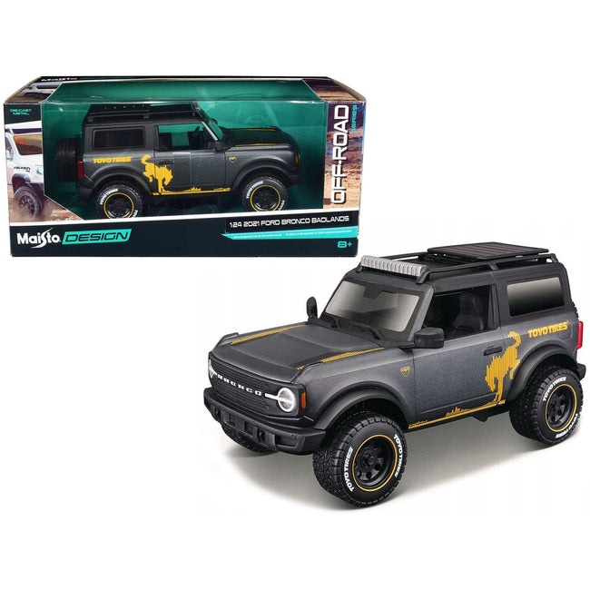 2021 Ford Bronco Badlands Dark Gray Metallic with Gold Graphics and Roof Rack "Off-Road" "Maisto Design" Series 1/24 Diecast Model Car by Maisto-Maisto-ModelCars.com
