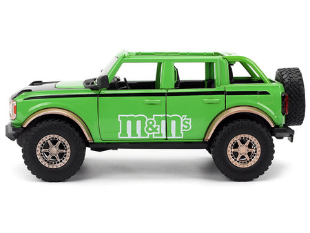 2021 Ford Bronco Green with Black Stripes and Green M&M's Diecast Figure "Hollywood Rides" Series 1/24 Diecast Model Car by Jada-Jada-ModelCars.com