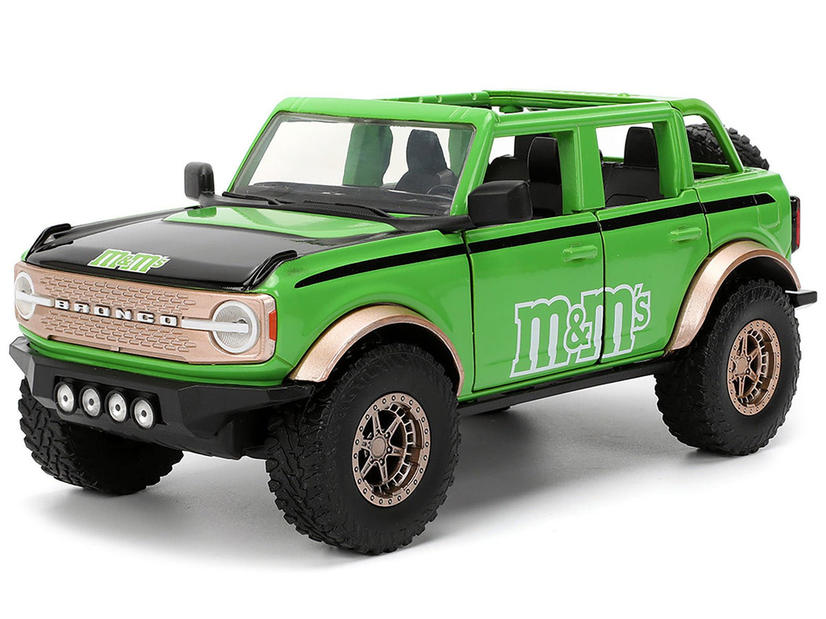 2021 Ford Bronco Green with Black Stripes and Green M&M's Diecast Figure "Hollywood Rides" Series 1/24 Diecast Model Car by Jada-Jada-ModelCars.com