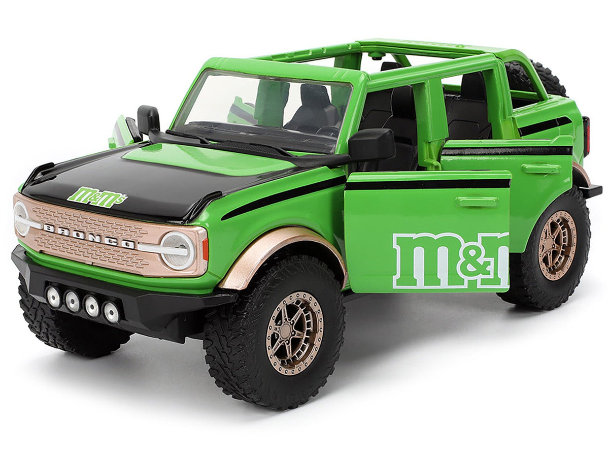 2021 Ford Bronco Green with Black Stripes and Green M&M's Diecast Figure "Hollywood Rides" Series 1/24 Diecast Model Car by Jada-Jada-ModelCars.com