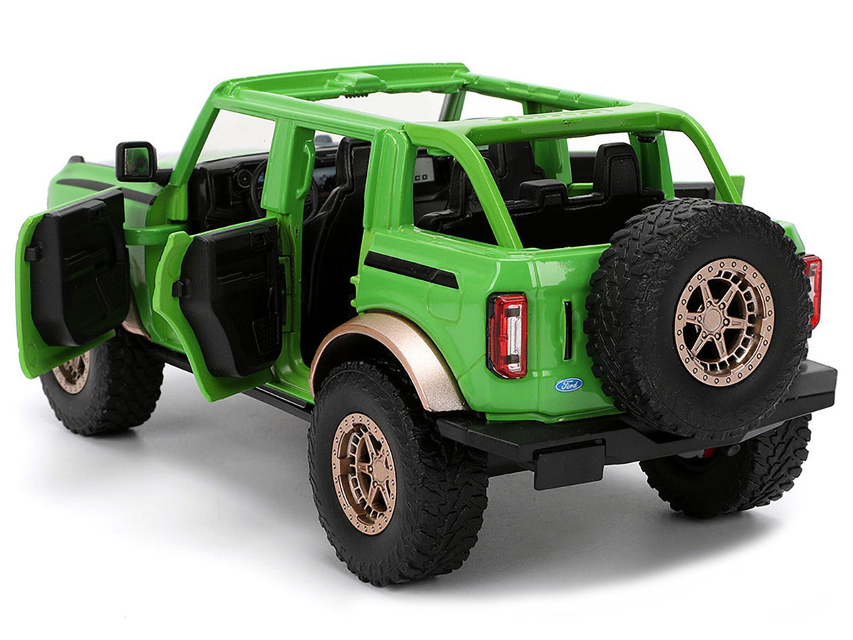2021 Ford Bronco Green with Black Stripes and Green M&M's Diecast Figure "Hollywood Rides" Series 1/24 Diecast Model Car by Jada-Jada-ModelCars.com