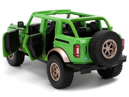 2021 Ford Bronco Green with Black Stripes and Green M&M's Diecast Figure "Hollywood Rides" Series 1/24 Diecast Model Car by Jada-Jada-ModelCars.com