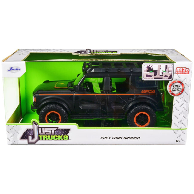 2021 Ford Bronco Matt Black with Orange Stripes and Roof Rack "Addictive Desert Designs" "Just Trucks" Series 1/24 Diecast Model Car by Jada-Jada-ModelCars.com