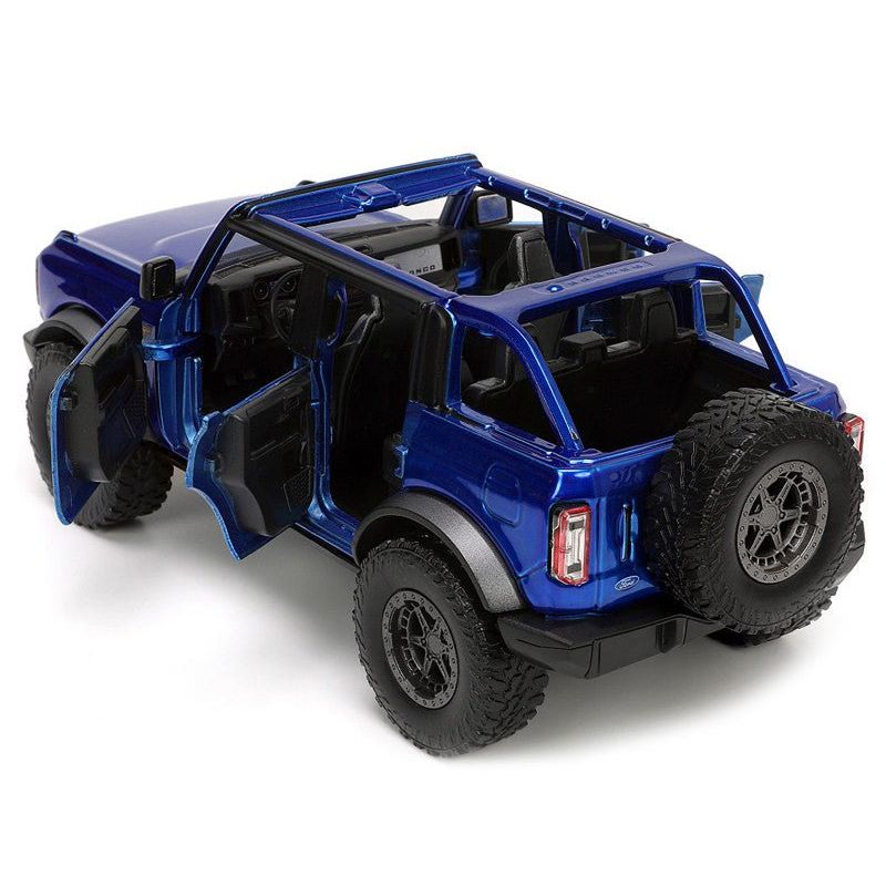 2021 Ford Bronco Open - Top Candy Blue Metallic with Extra Wheels "Just Trucks" Series 1/24 Diecast Model Car by Jada - Jada - ModelCars.com