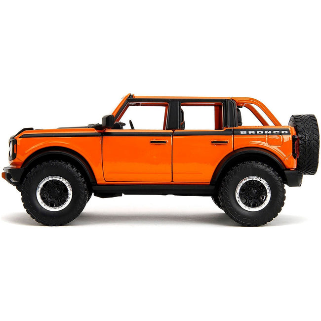 2021 Ford Bronco Open-Top Orange with Black Stripes and Hood with Extra Wheels "Just Trucks" Series 1/24 Diecast Model Car by Jada-Jada-ModelCars.com