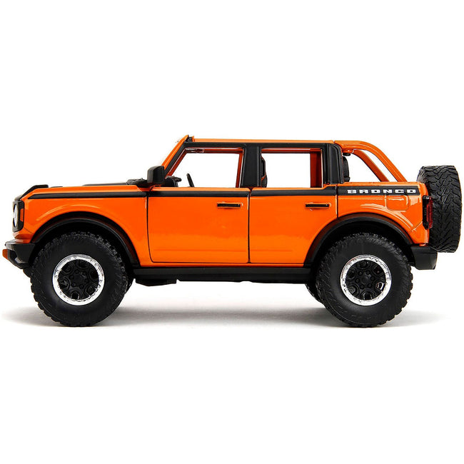 2021 Ford Bronco Open - Top Orange with Black Stripes and Hood with Extra Wheels "Just Trucks" Series 1/24 Diecast Model Car by Jada - Jada - ModelCars.com