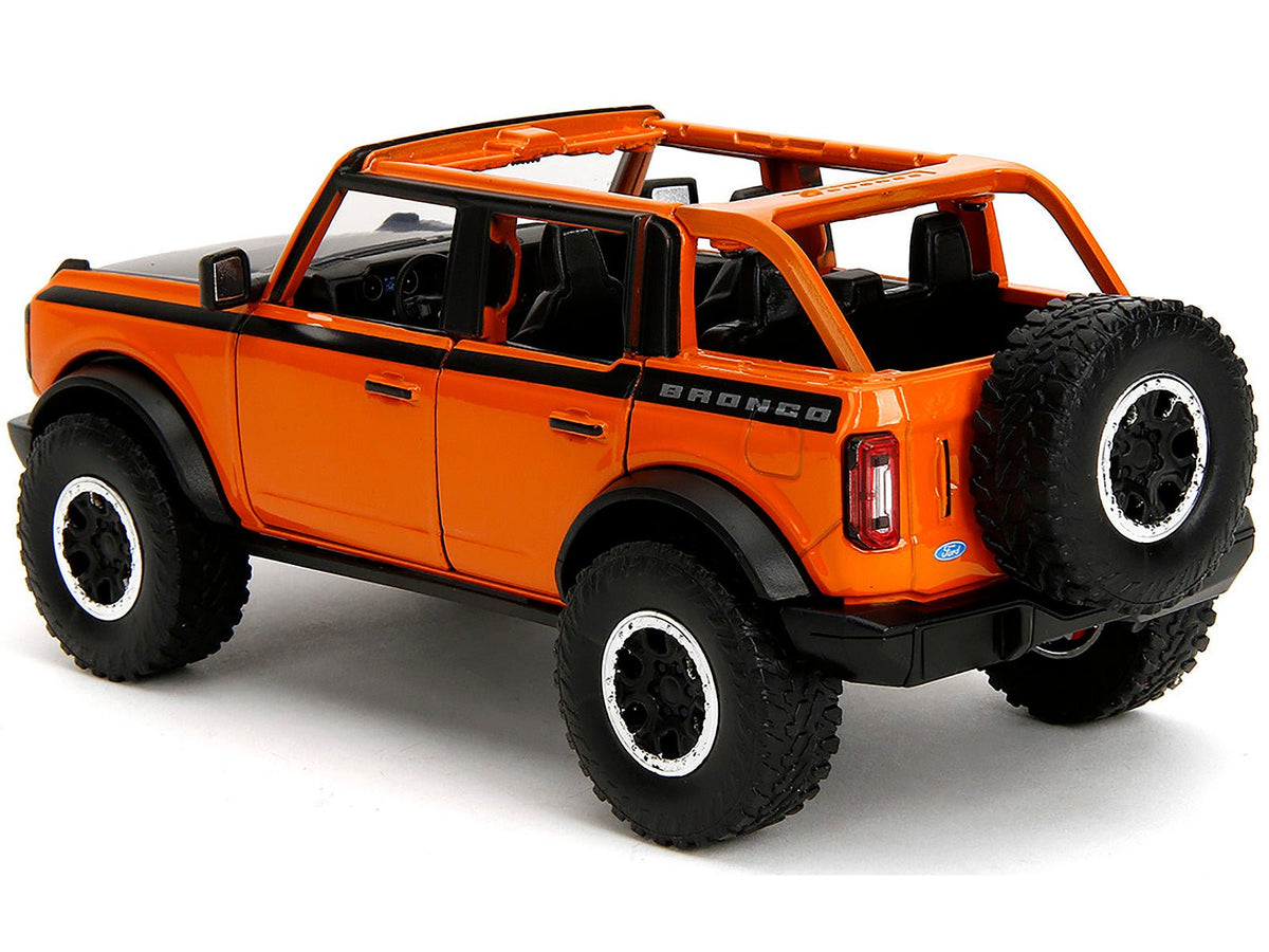 2021 Ford Bronco Open-Top Orange with Black Stripes and Hood with Extra Wheels "Just Trucks" Series 1/24 Diecast Model Car by Jada-Jada-ModelCars.com
