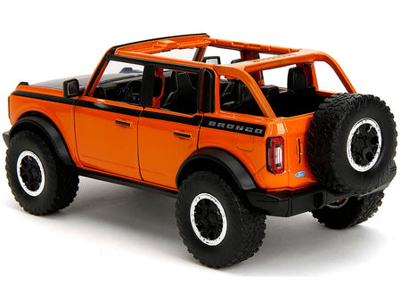 2021 Ford Bronco Open-Top Orange with Black Stripes and Hood with Extra Wheels "Just Trucks" Series 1/24 Diecast Model Car by Jada-Jada-ModelCars.com