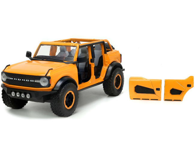 2021 Ford Bronco Orange Metallic with Extra Wheels "Just Trucks" Series 1/24 Diecast Model Car by Jada-Jada-ModelCars.com