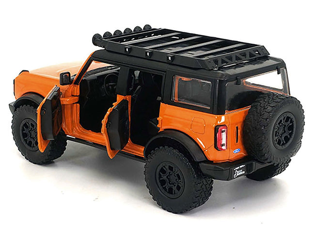 2021 Ford Bronco Orange with Black Stripes and Roof Rack "Just Trucks" Series 1/24 Diecast Model Car by Jada-Jada-ModelCars.com