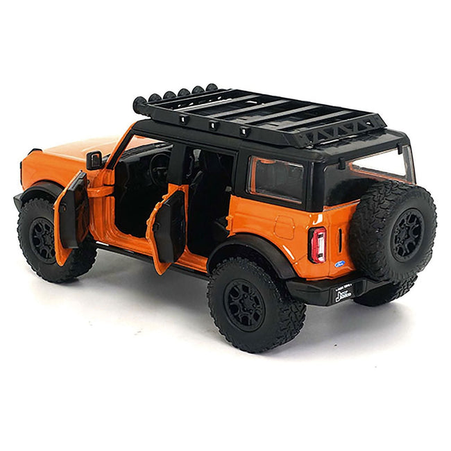 2021 Ford Bronco Orange with Black Stripes and Roof Rack "Just Trucks" Series 1/24 Diecast Model Car by Jada - Jada - ModelCars.com