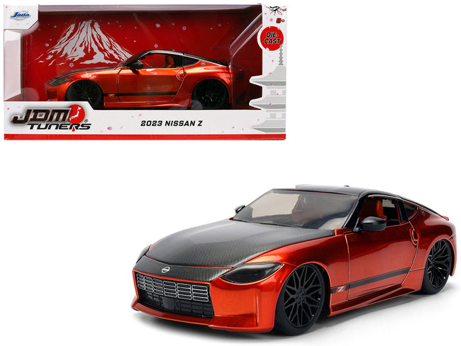 2023 Nissan Z Orange Metallic with Carbon Hood and Black Top "JDM Tuners" Series 1/24 Diecast Model Car by Jada-Jada-ModelCars.com