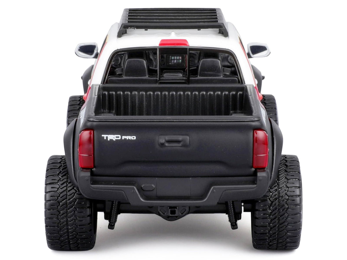 2023 Toyota Tacoma TRD PRO Off Road Pickup Truck White with Graphics and Roof Rack "Maisto Design" Series 1/27 Diecast Model Car Maisto-Maisto-ModelCars.com