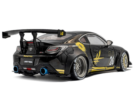 2024 Toyota GR86 Liberty Walk Body Kit RHD (Right Hand Drive) #24 Black with Gold Graphics 1/18 Diecast Model Car by Solido-Solido-ModelCars.com