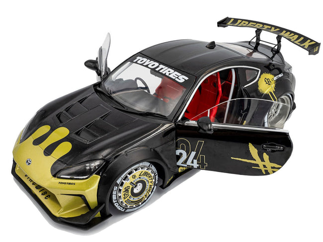 2024 Toyota GR86 Liberty Walk Body Kit RHD (Right Hand Drive) #24 Black with Gold Graphics 1/18 Diecast Model Car by Solido-Solido-ModelCars.com