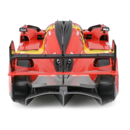 Red and yellow race car, rear view.