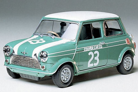 Green and white Mini Cooper toy car.