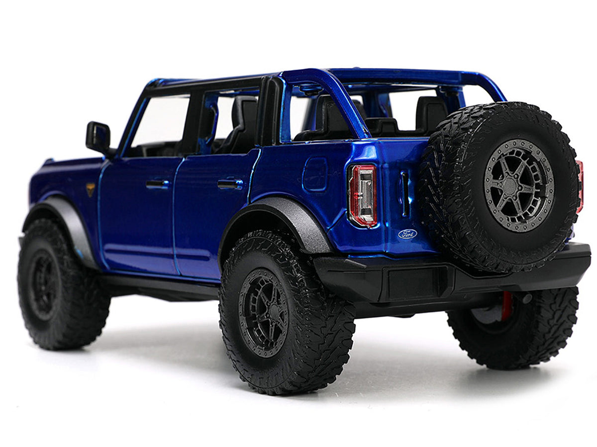 2021 Ford Bronco Open-Top Candy Blue Metallic with Extra Wheels "Just Trucks" Series 1/24 Diecast Model Car by Jada