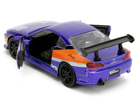 Purple and orange toy car with open doors and spoiler.