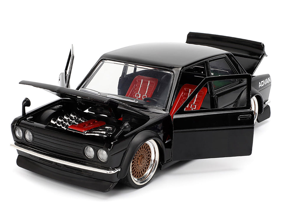 1973 Datsun 510 Black with Gold Wheels "JDM Tuners" Series 1/24 Diecast Model Car by Jada