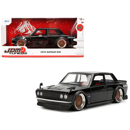 1973 Datsun 510 Black with Gold Wheels "JDM Tuners" Series 1/24 Diecast Model Car by Jada
