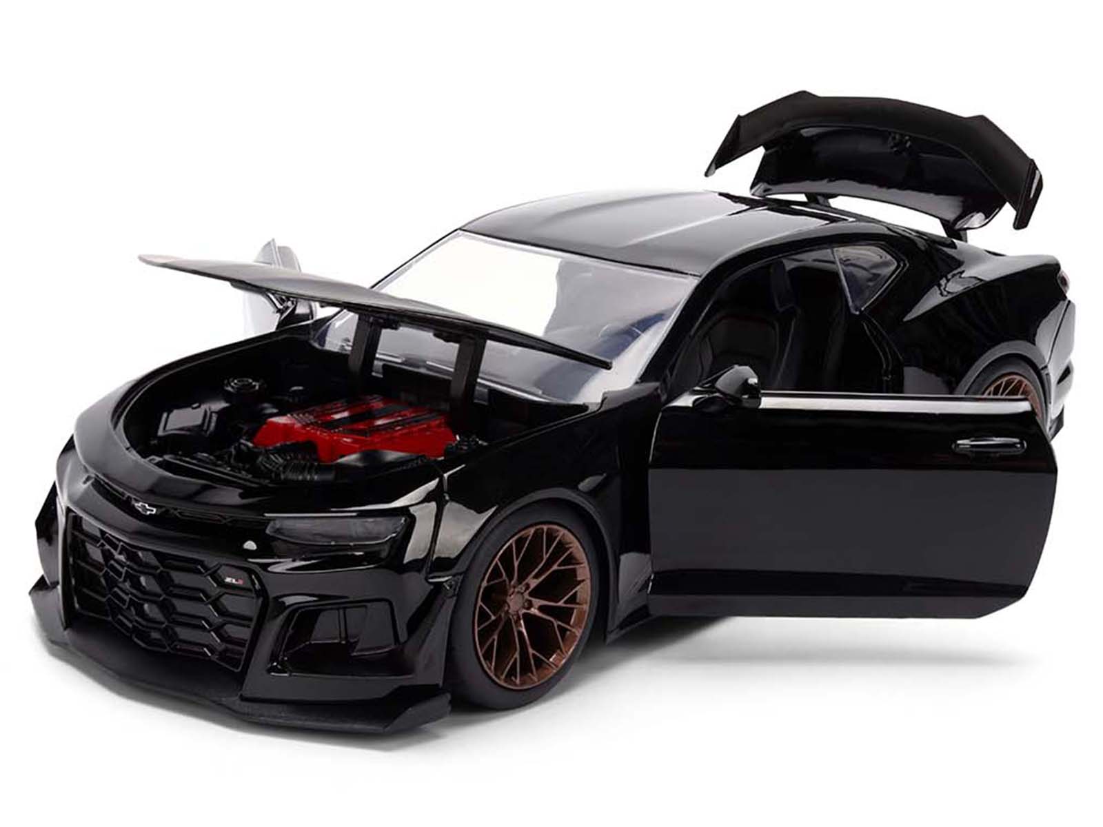 Black sports car model with open hood and doors.