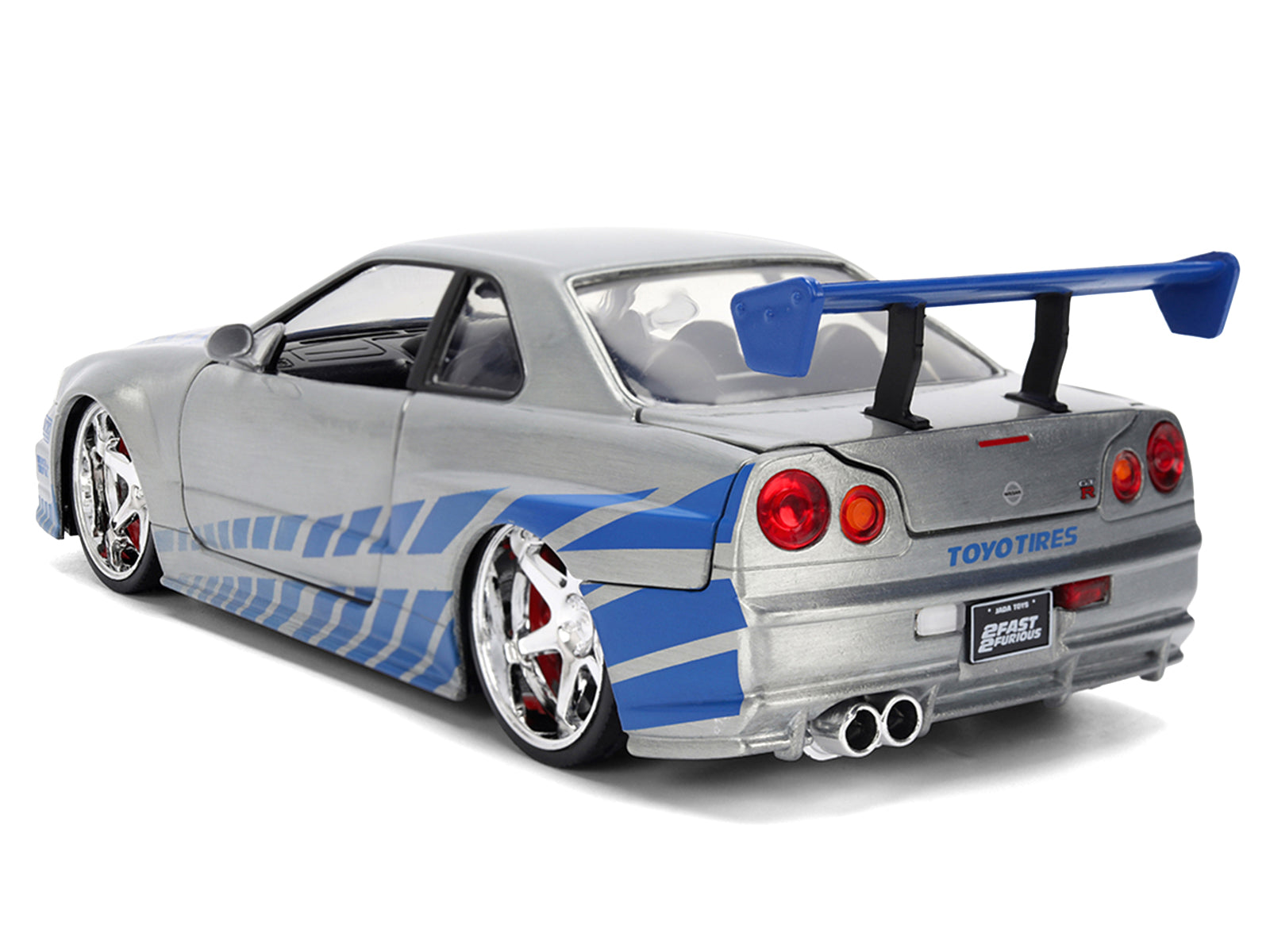 Silver sports car with blue accents.