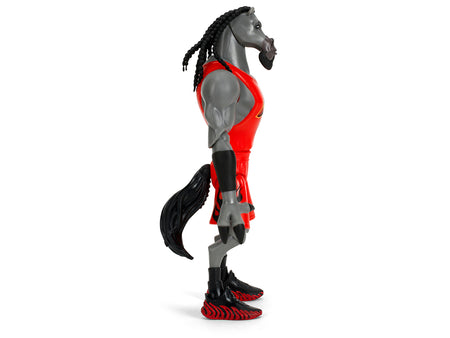 Toy horse figure in red outfit.