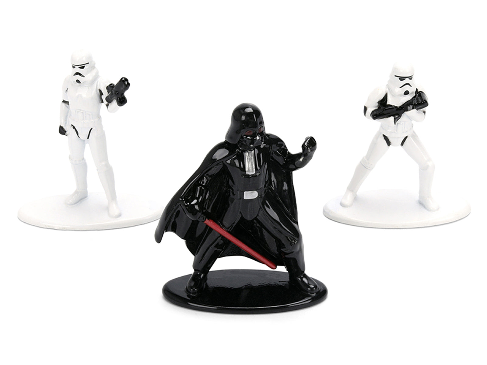 Darth Vader figurine flanked by two Stormtroopers.