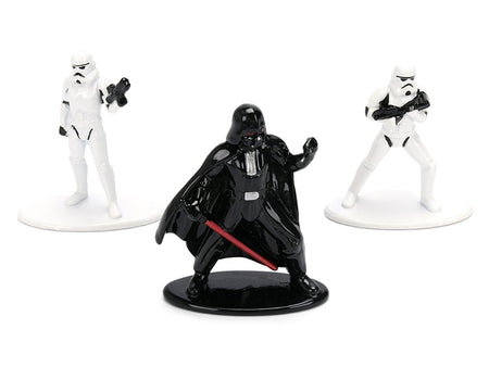 Darth Vader figurine flanked by two Stormtroopers.