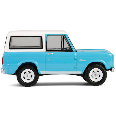 Blue & white Ford Bronco toy car
