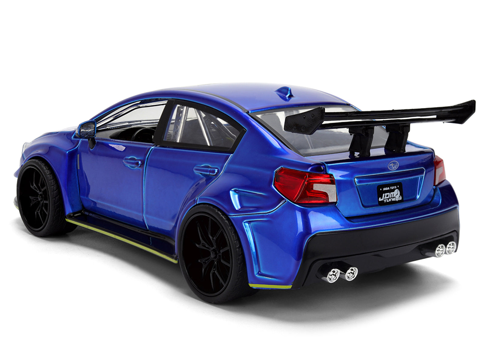 Blue Subaru sedan with black spoiler.
