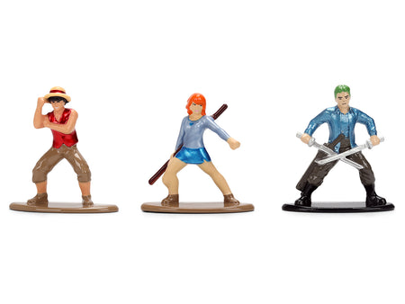 Three anime figurines on white background.