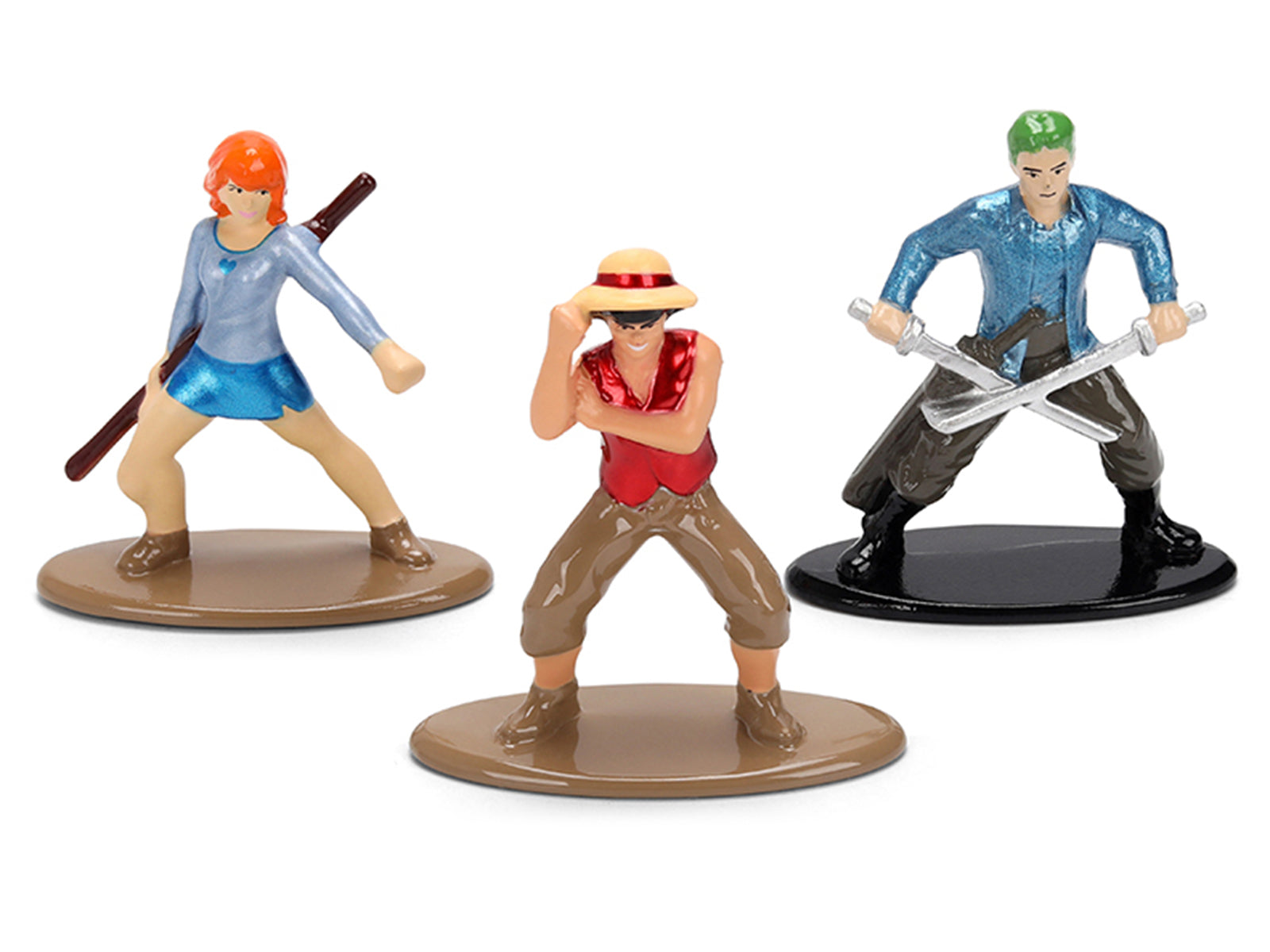 Three One Piece character figurines.