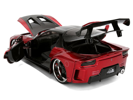 Red and black toy sports car with open doors and hood.