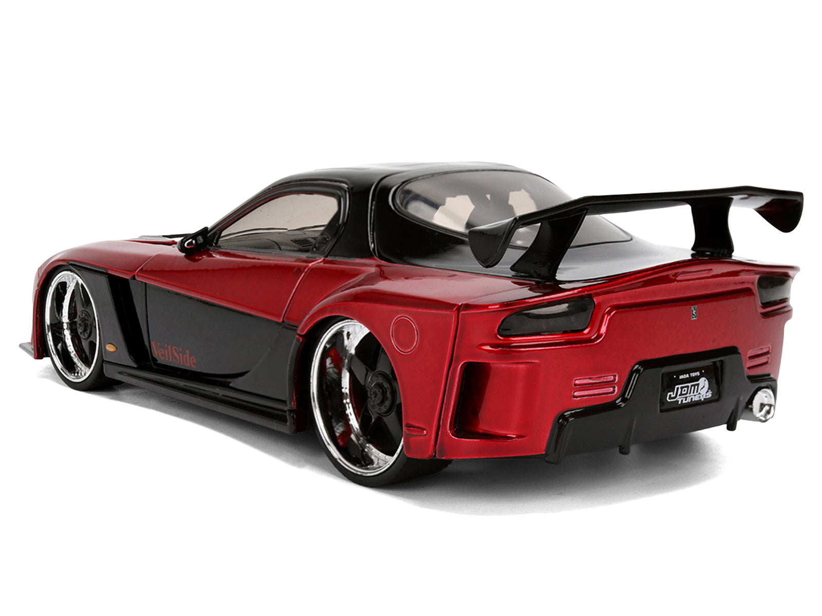 Red and black sports car with spoiler.