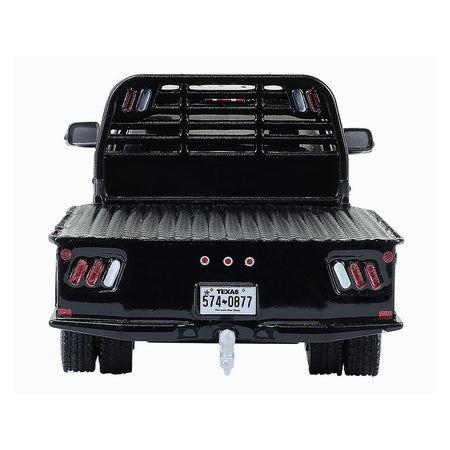 Black truck with Texas license plate 574-0877