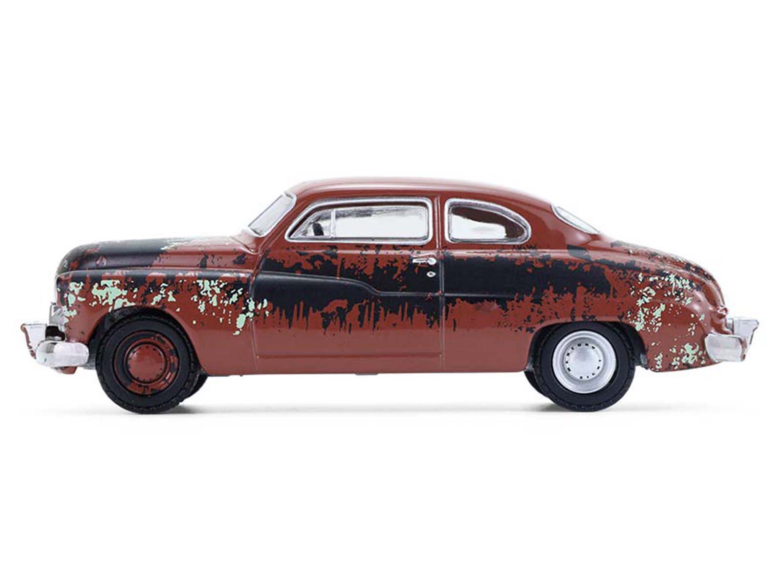 1948 Mercury Coupe model car with rust and black paint