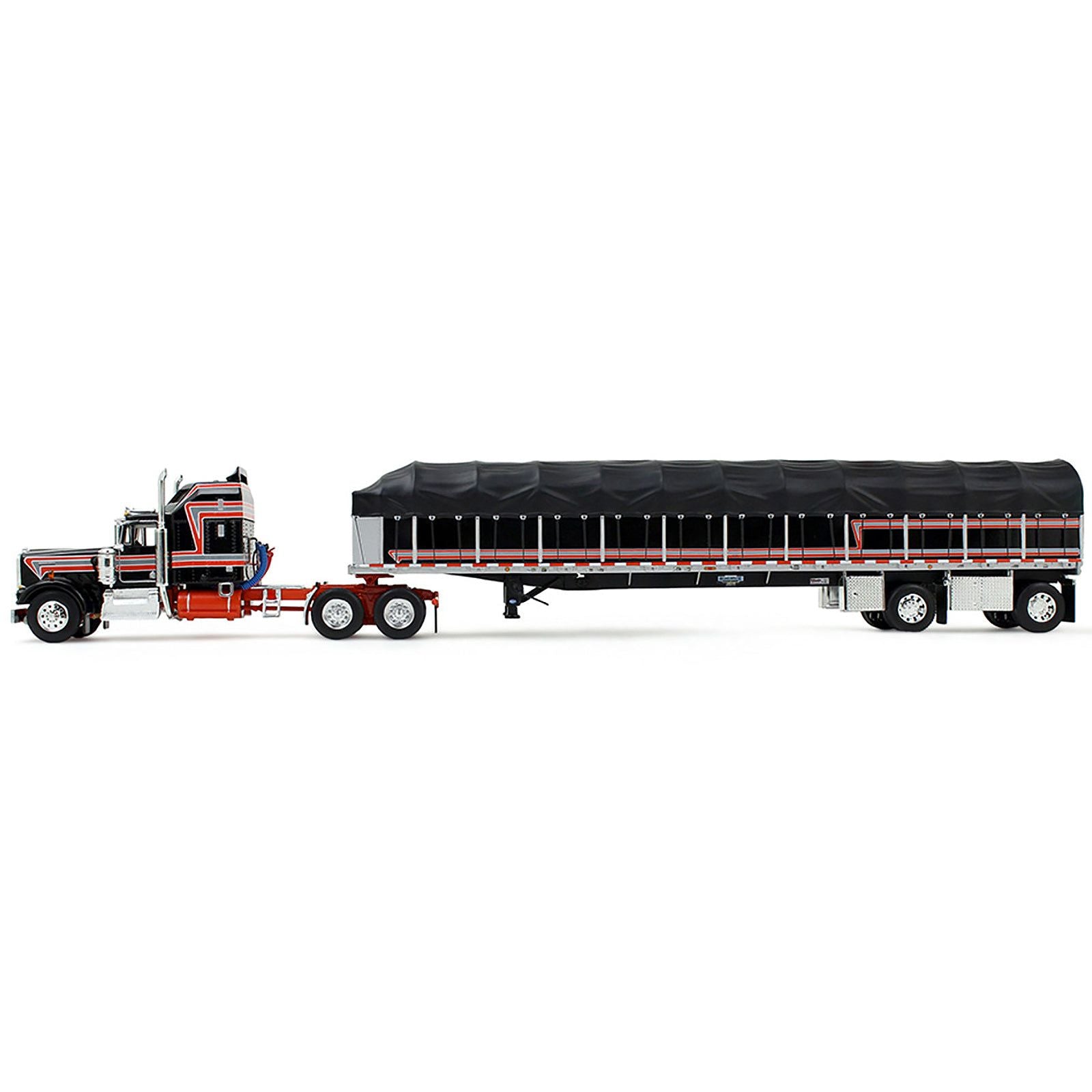 Toy semi-truck with trailer on white background.
