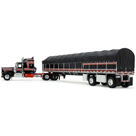 Model semi-truck with black trailer.