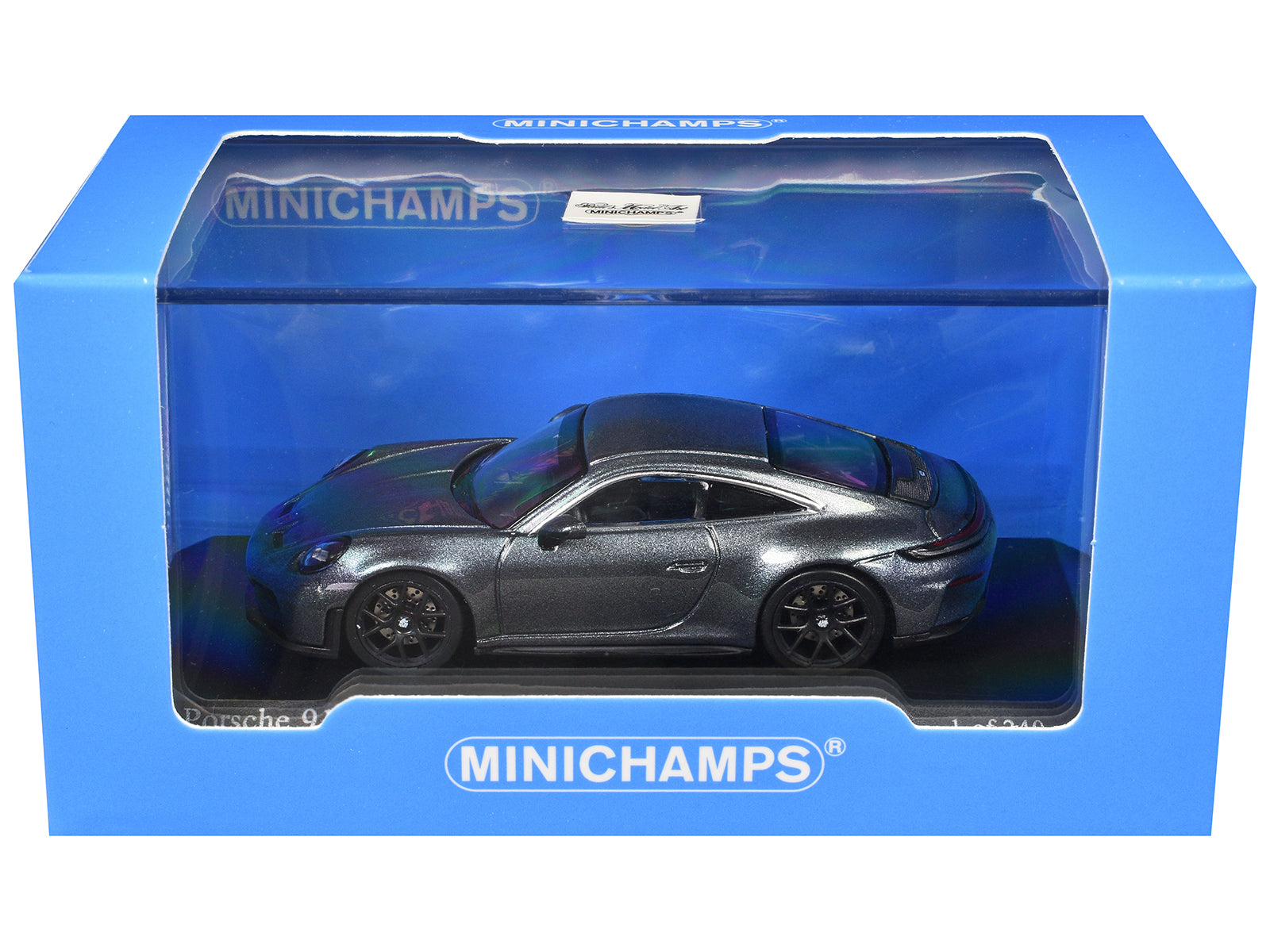 Gray toy Porsche 911 in a blue box.