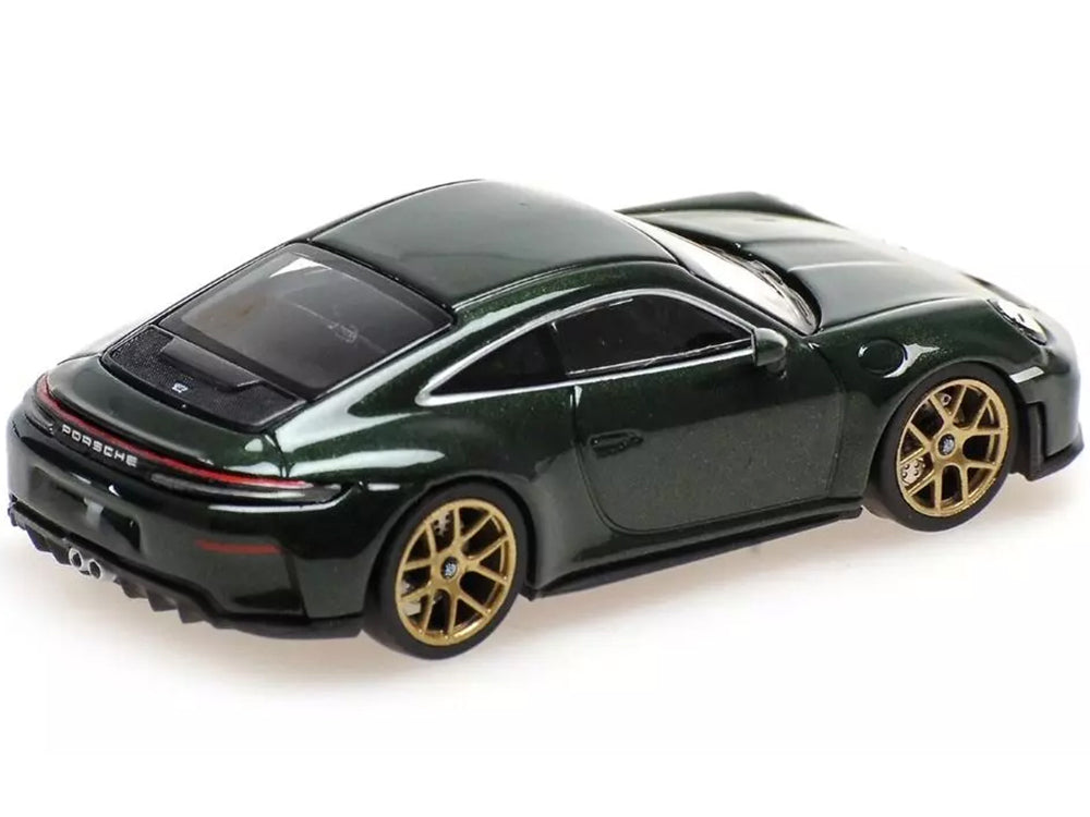 Green Porsche sports car with gold wheels.